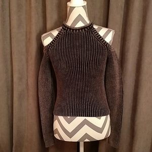 High neck sweater.
